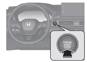 Bouton ENGINE START/ STOP (mise en marche/ arrêt du moteur)